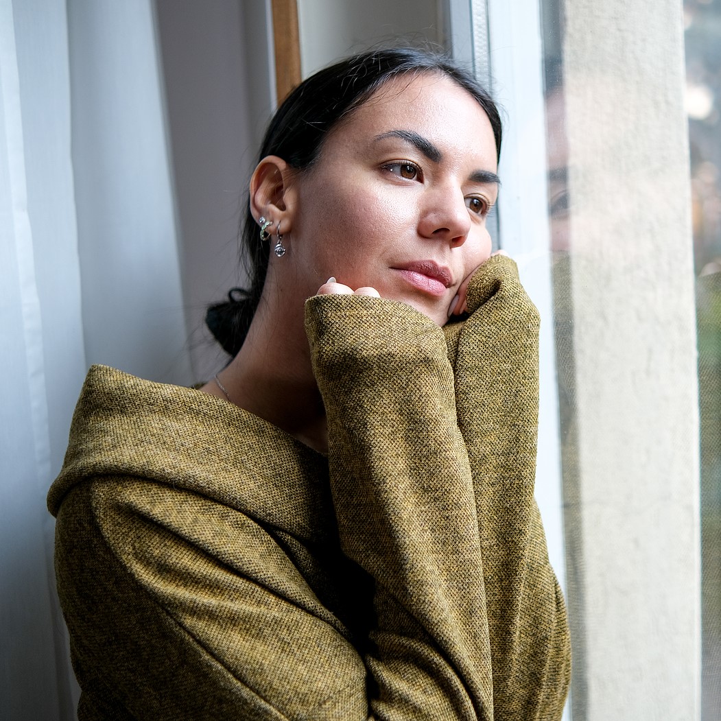 Consider Whether Adoption is Right for You / How Long Does the Birth Mother Have to Change Her Mind? Woman wondering "is adoption right for me?"