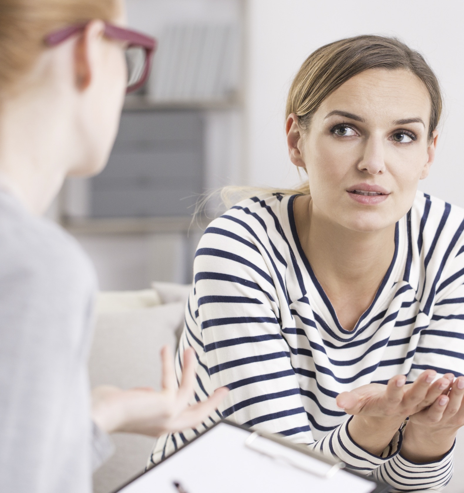 Options Information A woman receiving pregnancy option information in Hampstead, North Carolina